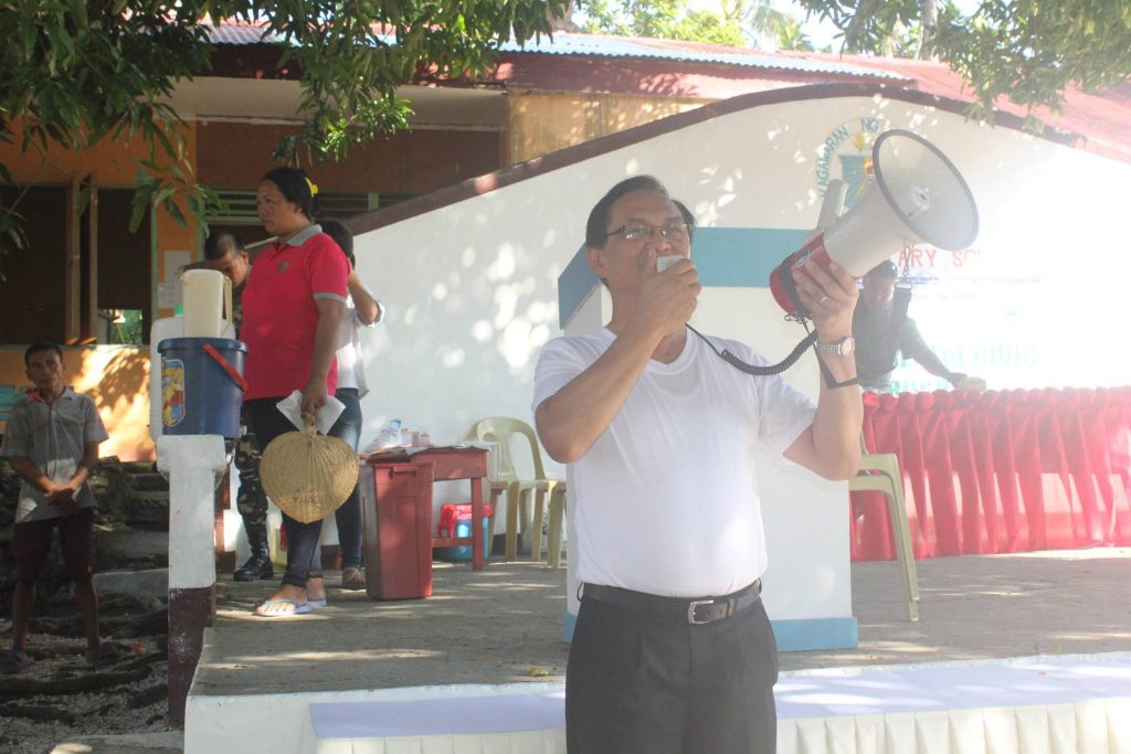 Mr. Dan delos Reyes giving out instructions during the medical mission